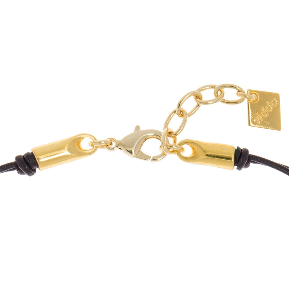 Gold plated double leather cord necklace with one triangle crystal charm